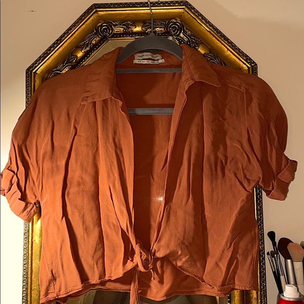 Loose orange v-neck